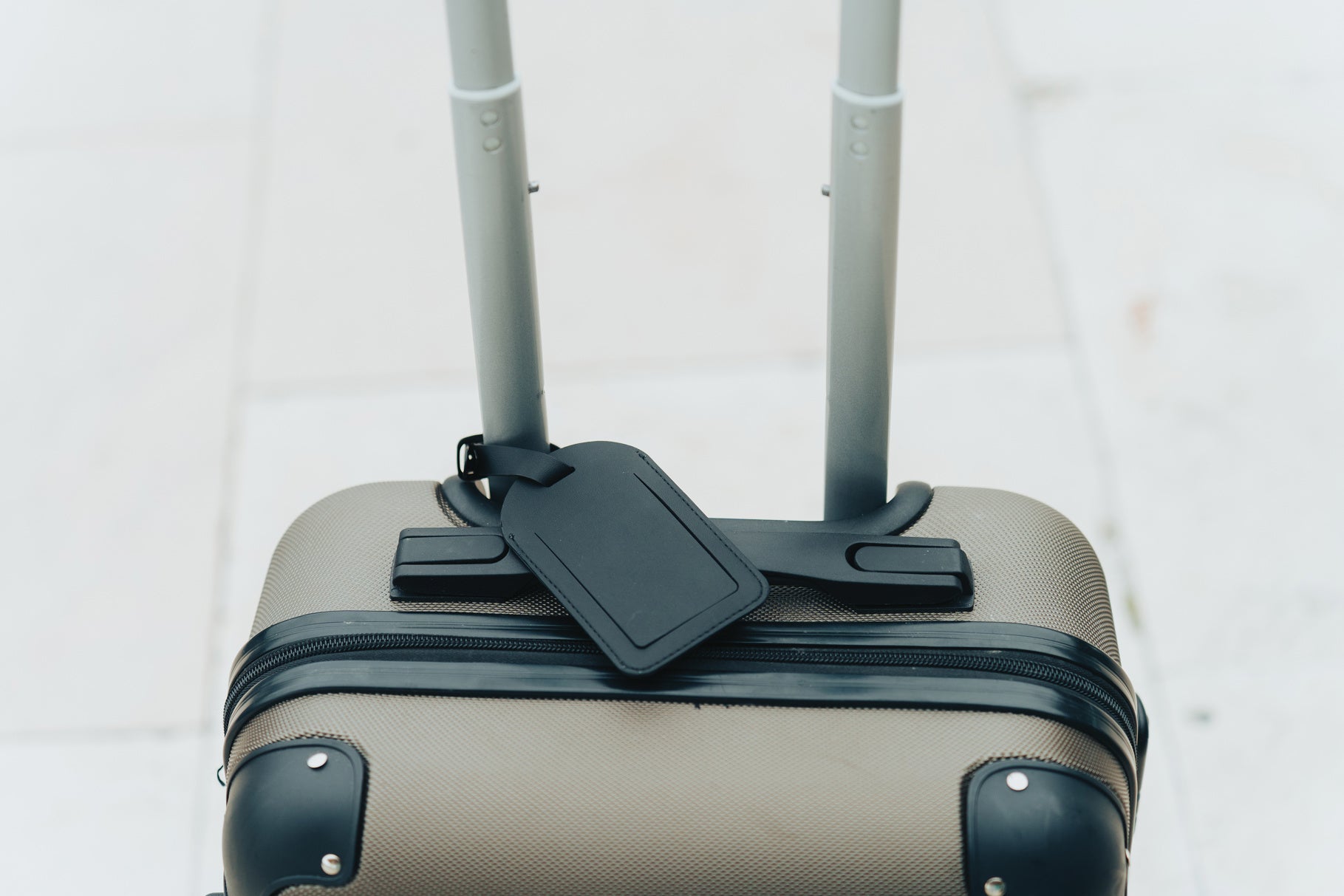 Globefind Dual on a suitcase